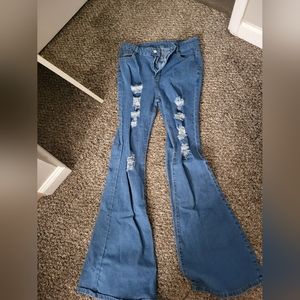 Bell bottom high waisted ripped jeans